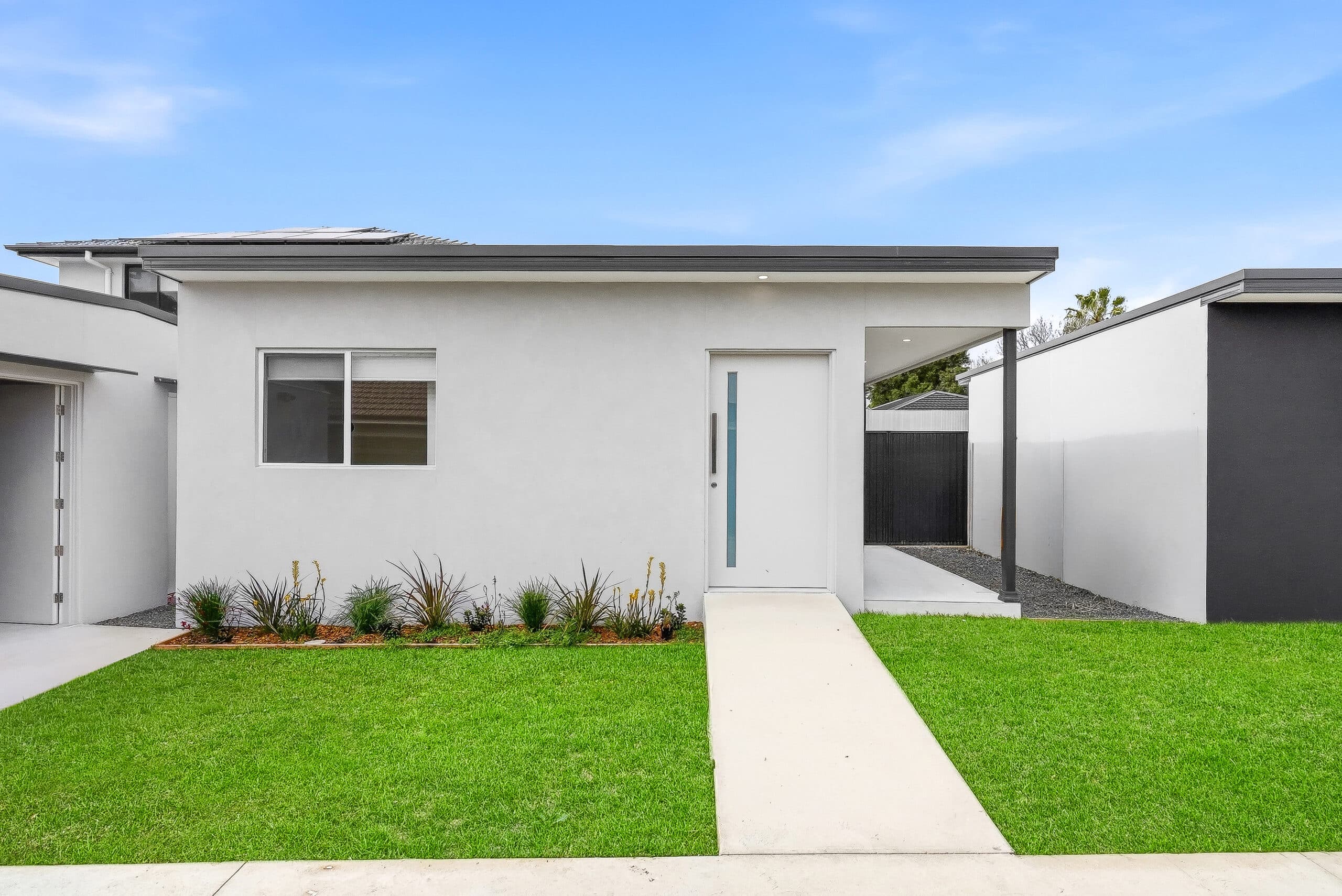 Front entrance and lawn of the Beyond Care one bedroom villa in Fairfield
