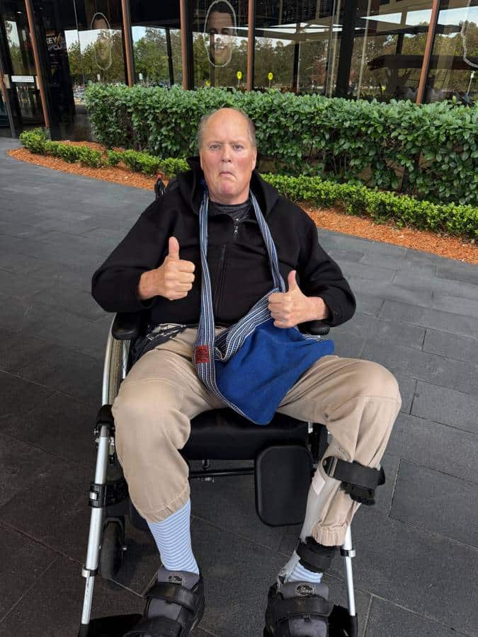 Simon out and about, giving a thumbs up