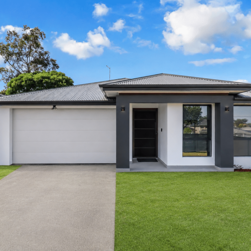 Front exterior of the Beyond Care Chester Hill home with driveway, garage and front lawn